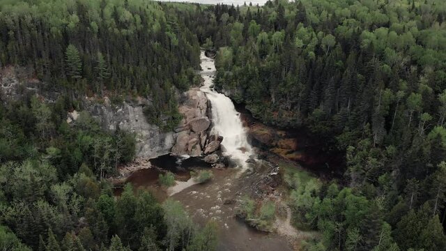 Aerial View Of A Beautiful  Neigette Waterfall In Rimouski, Canada With Trees In The Surrounding- Aerial Shot