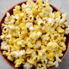 Salted Cheese Popcorn in a Brown Bowl.