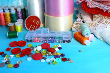 The workplace of a seamstress and designer in the studio. Set for needlework and tailoring of...