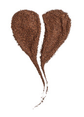 Heart shape made of coffee powder on white background