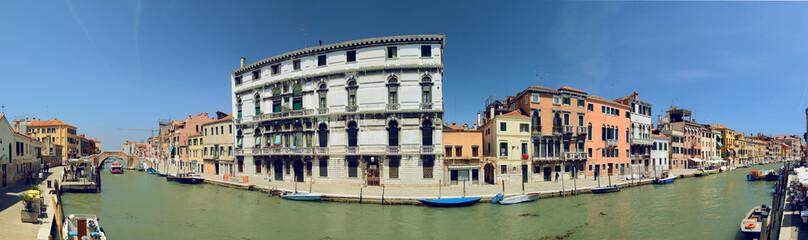 Panoramic summer view Cannaregio canal with Tre Archi Bridge (Ponte dei Tre Archi). Venice. Italy.