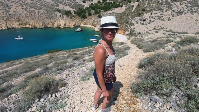 Female traveler posing at picturesque Krk Island Croatia