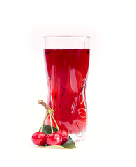 glass cherry juice and ripe and juicy cherry with green leaves on white background