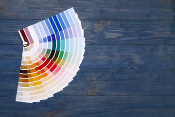 Color palettes on wooden background
