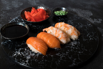 Close up of sashimi sushi set on black background