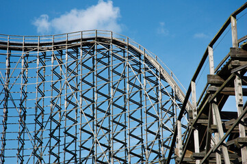 wooden Roller Coaster structure in sunny day