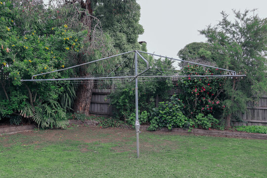 vintage rotary clothes line in australian backyard