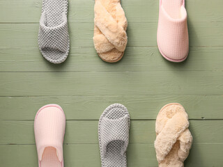 Soft slippers on wooden background