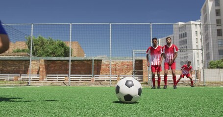 Soccer players having match on field - Powered by Adobe