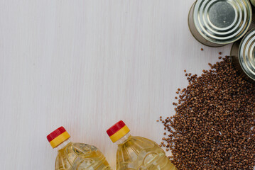 A set of social assistance products close-up on the table. Food, oil, cereals