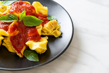 Italian tortellini pasta with tomato sauce