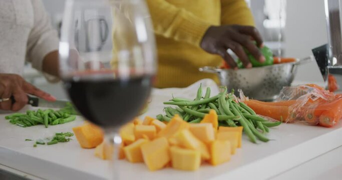 A senior African american couple cooking at home. Social distancing in quarantine