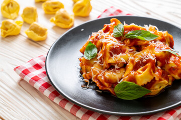 Italian tortellini pasta with tomato sauce