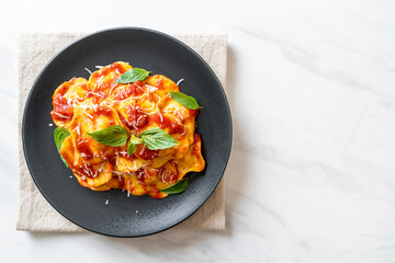Ravioli with tomato sauce and basil