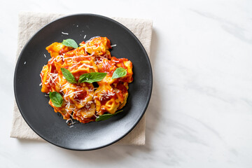 Italian tortellini pasta with tomato sauce