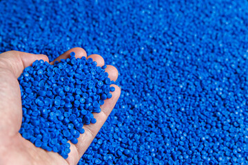 Blue plastic grain, plastic polymer granules,hand hold Polymer pellets, Raw materials for making...