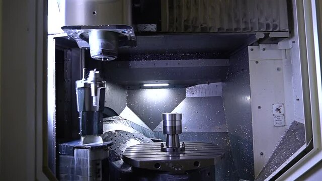 Programmable multi-tasking machine five-axis machining cente