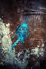 Blue paint splatter on a tree