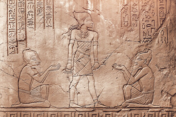 Fototapeta na wymiar ancient egyptian art Hieroglyphic carvings on the exterior walls