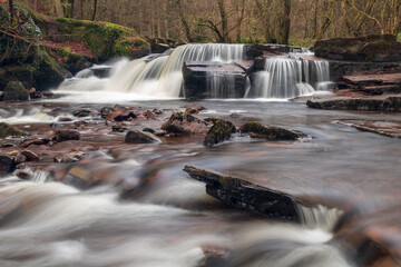 Beautiful Natural Cascading Waterfalls in Vibrant Landscape
