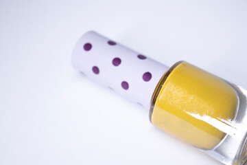 A bottle with blue nail polish on white background. nail lacquer. Nail manicure concept. Isolated, copy space. 