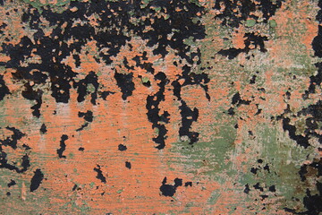 Rusty, orange surface of weathered iron plate, machine.