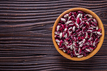 Fresh organic natural beans on wooden rustic background
