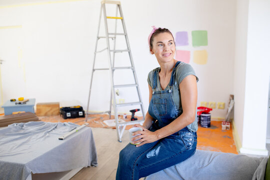Women in Social Distancing drinking coffee at home