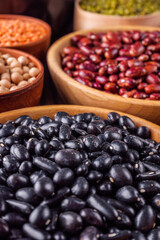 Fresh organic natural beans on wooden rustic background