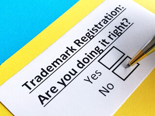 Obraz premium One person is answering question about trademark registration.