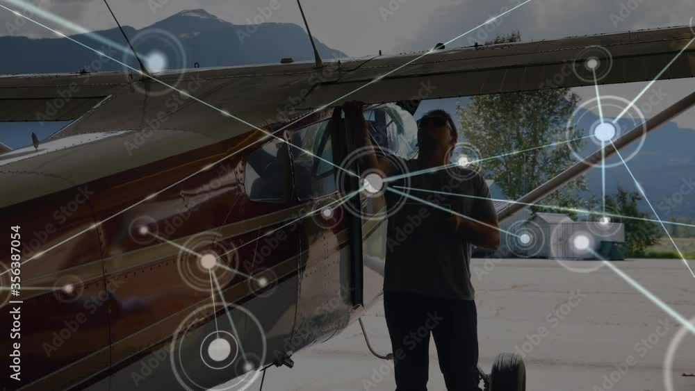 Poster animation of global network of connections with aeroplane in background