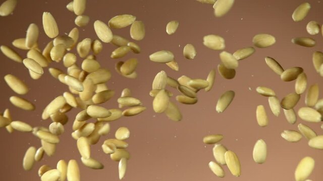 Super slow motion of flying almond nuts collision. Filmed on high speed cinema camera, 1000 fps.