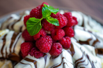 Sweet Waffles with milk chocolate, white chocolate, vanilla cream, strawberries, banana, vanilla ice cream sweet popcorn