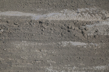 Tyre track on dirt sand or mud, retro tone, grunge tone, drive on sand, off road track