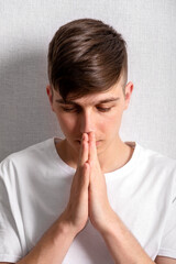 Fototapeta premium Young Man Praying