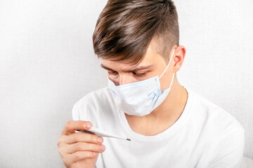 Young Man with a Flu Mask