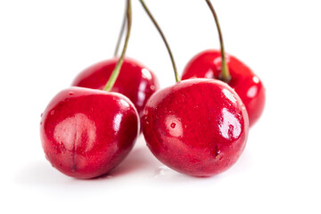 Sweet red cherry berries isolated on white background