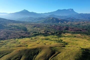 Mount Kinabalu with blue sky background.