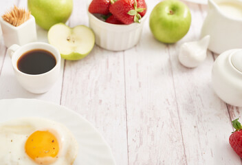 Healthly food. Continental breakfast in hotel room or bed. Fried eggs with sausages. Cup of coffee. Menu template. Cookery. Cooking. Romantic french or rural breakfast on Valentine.