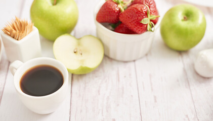 Detox concept. Tasty fruits and berries. Healthly food. Veganism, vegetarianism, raw food diet. Strawberries and apples. Summer fresh fruits. Copy space. Vitamins in food. Healthy breakfast