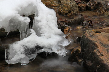 Water in the nature. Pebbles. Stones. Fresh and clean water.