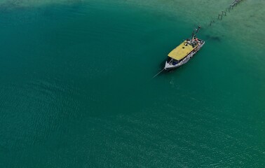 Aerial view on the sea and boat.