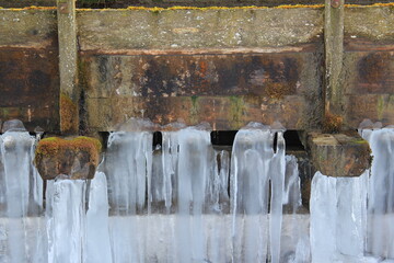 Icicles on the wooden structure.