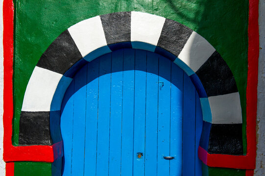 Tunisia, Cap Bon. Hammamet. Traditional decorated door. Detail