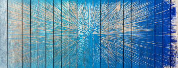 Splash bleu sur fond bois éclaboussé de peinture bleue 