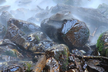 Close up of river and small rapids, wild water, dangerous nature.