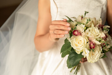 Obraz na płótnie Canvas Bride with wedding bouquet at wedding day