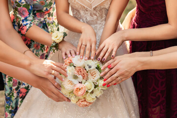 Bride, bridesmaids and wedding bouquet