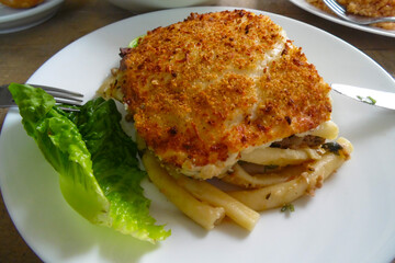 Pastitsio (Παστίτσιο), traditional Greek baked pasta dish, with minced meat and bechamel sauce
