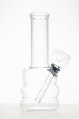 glass water bong pipe for smoking marijuana in white studio